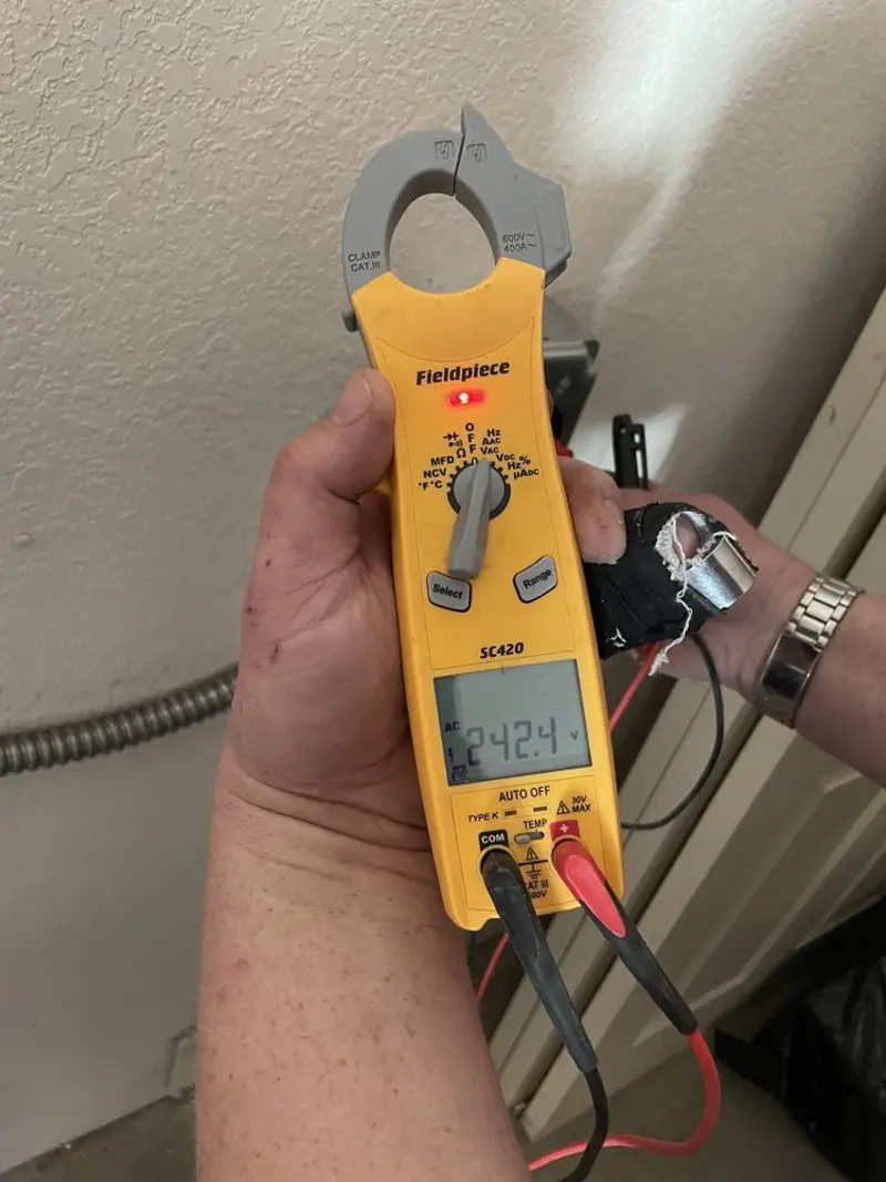 Voltage testing with clamp meter during Electrical Installation Services in Leesburg